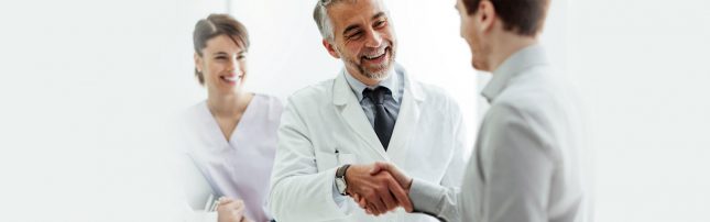 Common Dental Assistant Interview Dentist shaking hand with the Dental assistant after interview