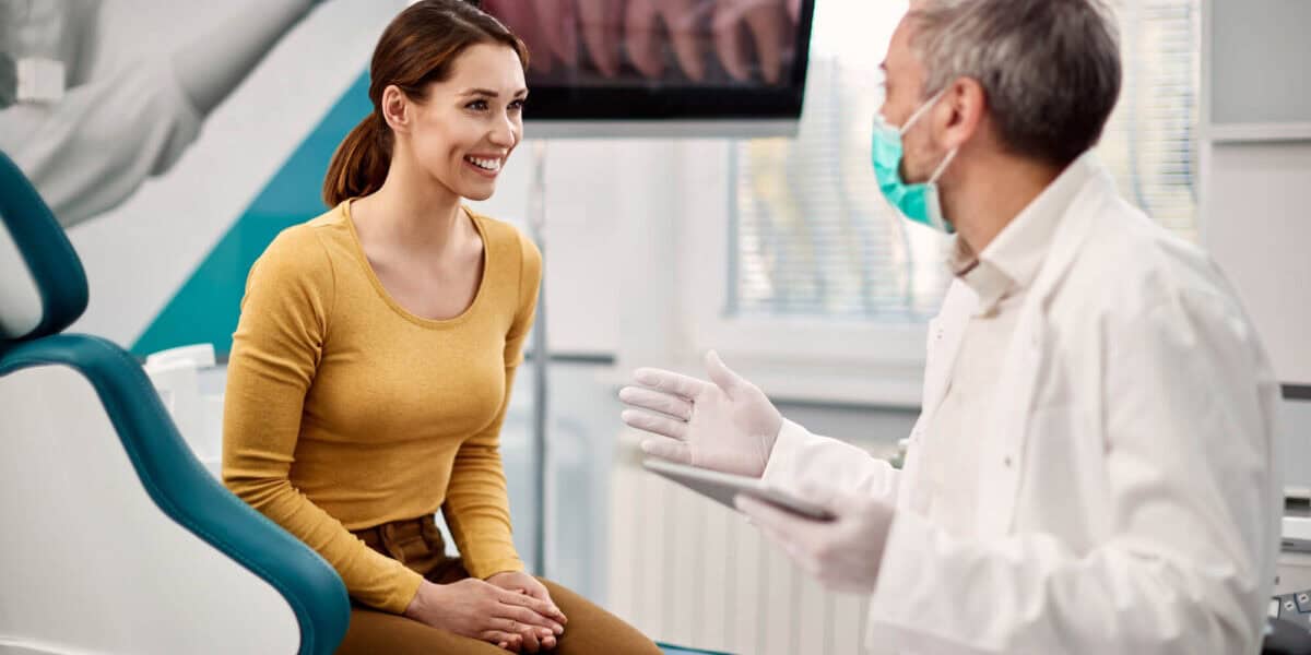 dentist discussing comprehensive tooth filling services with patient