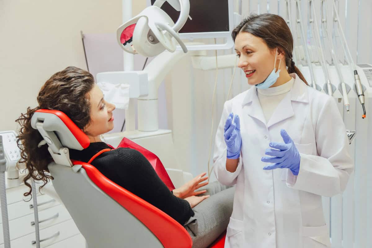 dentist explaining the sedation dentistry in Georgia procedure