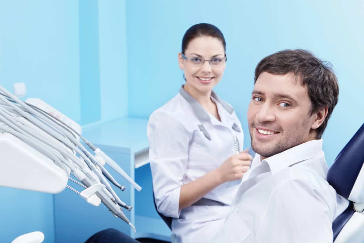 patient having an appointment for dental bridges for missing teeth