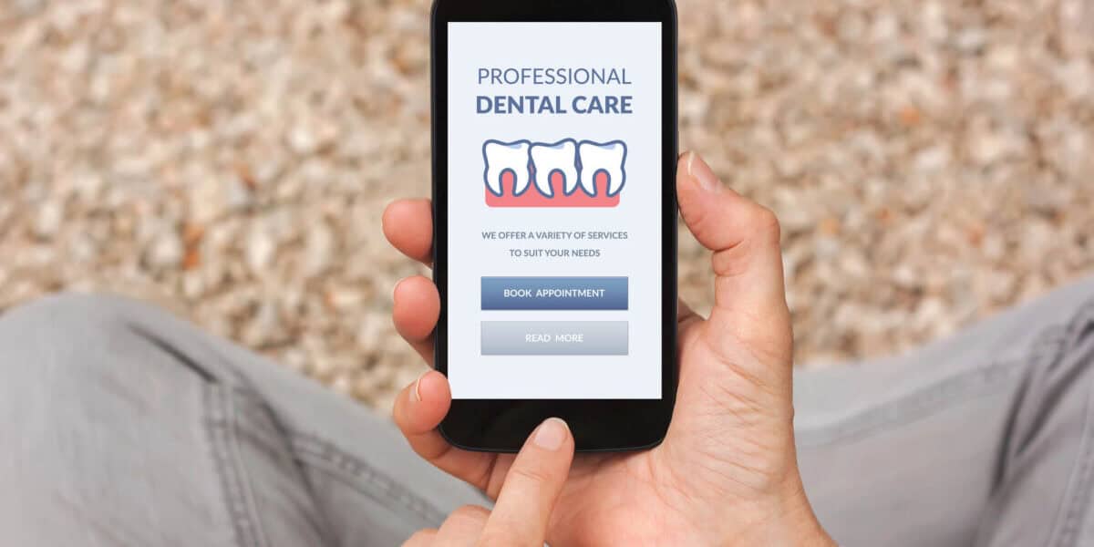 person about to book appointment for dental bridges for missing teeth