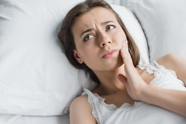 woman-with-tooth-pain-wondering-where-to-get-pain-relief-in-decatur-ga