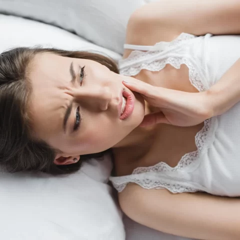 woman in pain needing Affordable Dental-Pain-Relief-in-Decatur-GA