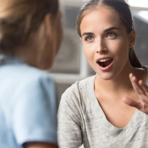 parent talking to her child about Pediatric Dental Exams in East Point GA